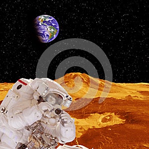 Astronaut with camera and far planet. Space mission. The elements of this image furnished by NASA