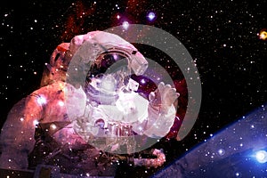 Astronaut in deep space. Elements of this image furnished by NASA