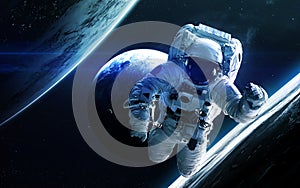 Astronaut deep space. Elements of this image furnished by NASA