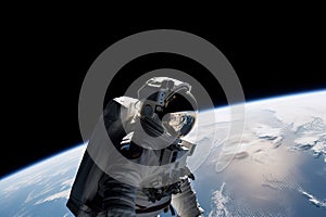 astronaut, floating weightlessly in space, taking in the view of the earth below