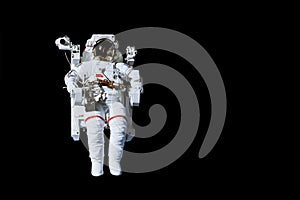 Astronaut with a jetpack isolated on black background with copy space