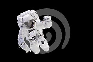 Astronaut with a jetpack isolated on black background with copy space,  Elements of this image are furnished by NASA