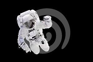 Astronaut with a jetpack isolated on black background with copy space,  Elements of this image are furnished by NASA photo