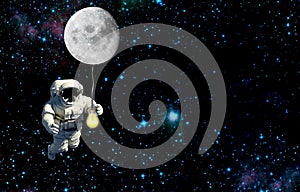 Astronaut lighting moonlight galaxy.mission in outer space photo