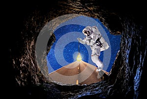 Astronaut lighting route in outer space photo