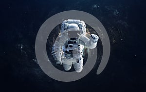 Astronaut in outer space. Elements of this image furnished by NASA