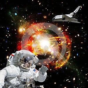 Astronaut in outer space. Shuttle on the backdrop. The elements of this image furnished by NASA