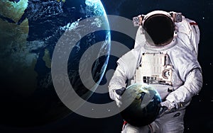 Astronaut in outer space. Spacewalk. Elements of this image furnished by NASA