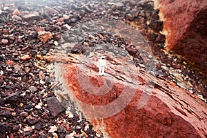 Astronaut over martian soil