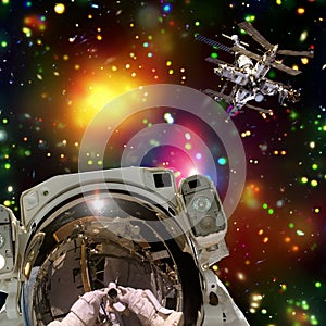 Astronaut and space station. Wonderful view of space. The elements of this image furnished by NASA