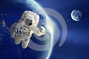 Astronaut or Spaceman floating in space with Earth planet and moon background