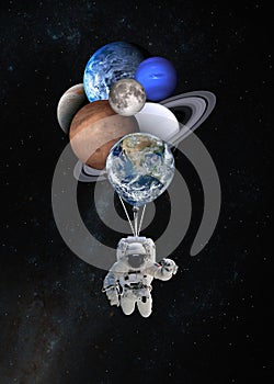 Astronaut spaceman with planets shaped balloons in solar system. Elements of this image furnished by NASA