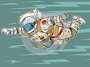 An astronaut in a spacesuit flies forward like a superhero. Weightlessness