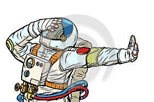 Astronaut in a spacesuit. Gesture of denial, shame, no