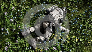 Astronaut is sprawled out on a vibrant green meadow dotted with colorful wildflowers, basking in sunlight. 3d render