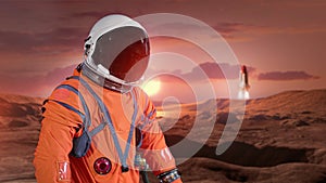 Astronaut on surface of red planet Mars.Elements of this image furnished by NASA.