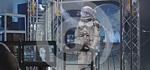 Astronaut walking on a treadmill