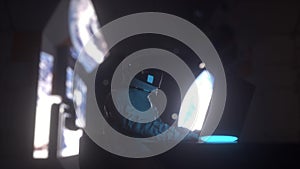 Astronaut works on his laptop in futuristic spaceship. 3d rendering