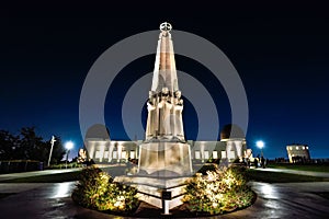 The Astronomers Monument in front of Griffith Observatory at Night - Los Angeles, California