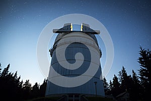 Astronomical Observatory under the night sky stars