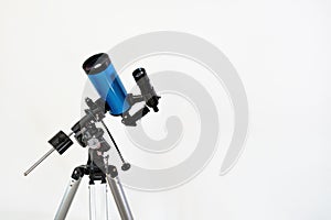 Astronomical telescope with optical system Maksutov-Casegrain on a white background