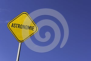 astronomie - yellow sign with blue sky background