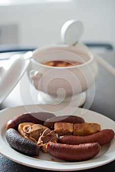 Asturian gastronomy. Traditional fabada and compango in a kitchen. With chorizo, ham and blood sausages. Spain photo