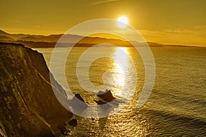 Asturias coast. Sunset over Cabo Busto cliffs, Spain