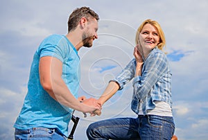 asual acquaintance concept. Man with beard and shy blonde girl on first date. Couple just meet to hang out together