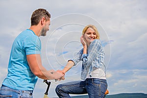 asual acquaintance concept. Man with beard and shy blonde girl on first date. Woman feels shy in company with attractive