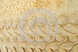 Asuras using the serpent Vasuki to churn the sea on the bas-relief of the Churning of the Sea of Milk in Angkor Wat