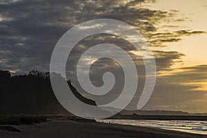 Sunset on Asturias beach. Clouds over the Cantabrian Sea photo