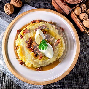 Atascaburras, also called ajo mortero, is a dish from Castilla la Mancha with potatoes, garlic, cod and eggs photo