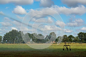 Ð¡atastrophic drought and heat in Europe, nature disaster, irrigation of grass fields