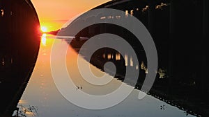 Atchafalaya swamp bridge at sunset in Louisiana.