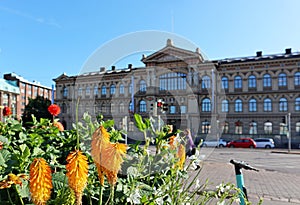 Ateneum finnish big museum in Helsinki and flowers summer city streets