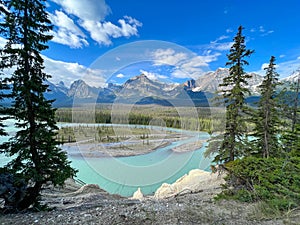 Athabasca River and surrounding mountains along the Ice Fields Parkway in Jasper National Park in Canada