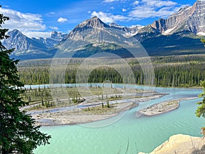 Athabasca River and surrounding mountains along the Ice Fields Parkway in Jasper National Park in Canada