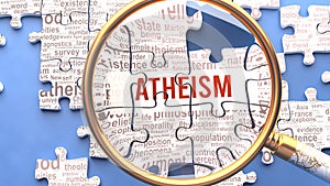Atheism and related ideas on a puzzle pieces. A metaphor showing complexity of Atheism analyzed with a help of a magnify