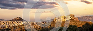 Athens, Greece. Acropolis of Athens and Mount Lycabettus panorama from Areopagus hill at sunset