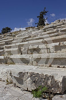 Architectural close up of the stone steps of the Theatre of Dionysus ruin in Athens, Greece