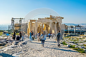 ATHENS, GREECE, DECEMBER 10, 2015: Many tourists visiting ancient temple Parthenon on Acropolis, Athens, Greece...IMAGE