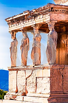 Athens, Greece: Detail of Caryatid Porch on the Acropolis. Ancient Erechtheion or Erechtheum temple. World famous photo