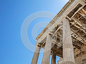 Athens, Greece. Erechtheion Temple of Athena on Acropolis hill, blue sky background