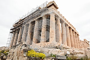 Athens, Greece - February 23, 2019: Western facade of the Parthenon temple on the Acropolis of Athens, Greece under reconstruction
