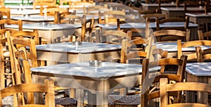 Athens, Greece. Greek tavern empty tables and chairs at Plaka.