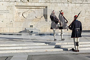 ATHENS, GREECE - JANUARY 19 2017: Evzones - presidential ceremonial guards in the Tomb of the Unknown Soldier, Greek Parliament