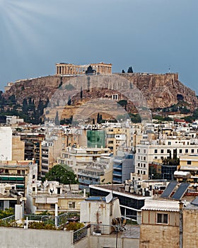 Athens, Greece, view of Parthenon ancient temple illuminated by sunrays on Acropolis hill