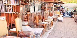 Athens, Greece. Vintage chairs collection at Monastiraki, an open air flea market