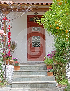 Athens Greece, vintage house entrance with flowers and plants photo